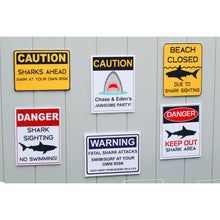 Load image into Gallery viewer, Decorate your Jaws Party with these fun shark decorative signs. You will receive a PDF file formatted 8 ½ X 11inches with 8 different Shark Warning Signs. Two of the signs can be edited with your child's name.