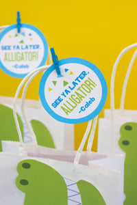 Chomp! Chomp! There's a party in the swamp! Use this template to decorate the favor bags for your Alligator birthday party. This PDF file also includes editable tags, to add the names of your guests or your child's name.